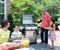 Family grills on a Weber Spirit SP-310 gas barbecue